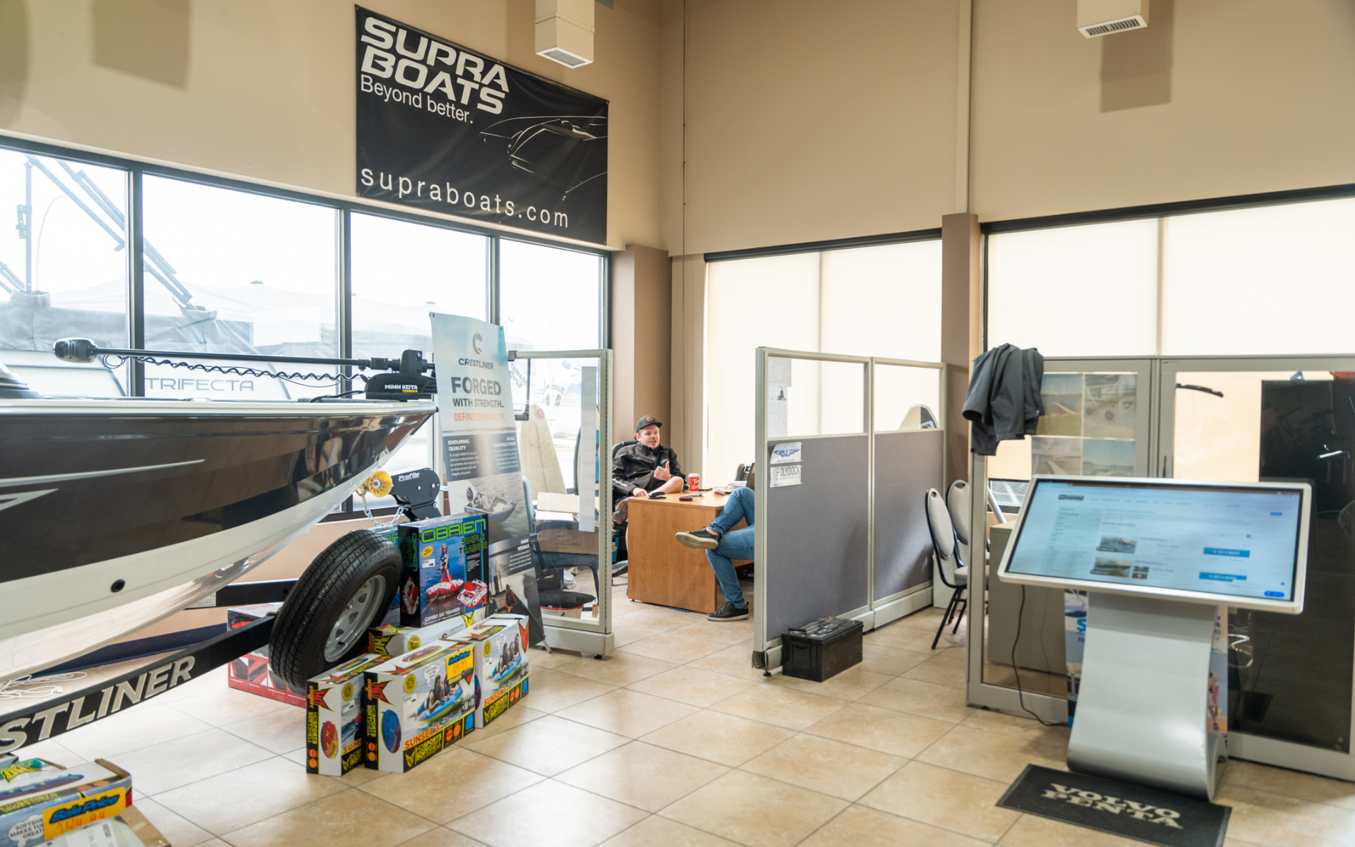 Interior of Martin Motorsports showroom in Saskatoon featuring boats and power sport vehicles